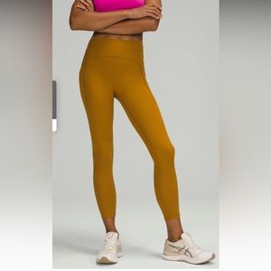 Lululemon Power Thru HR Tight 25” in gold spice